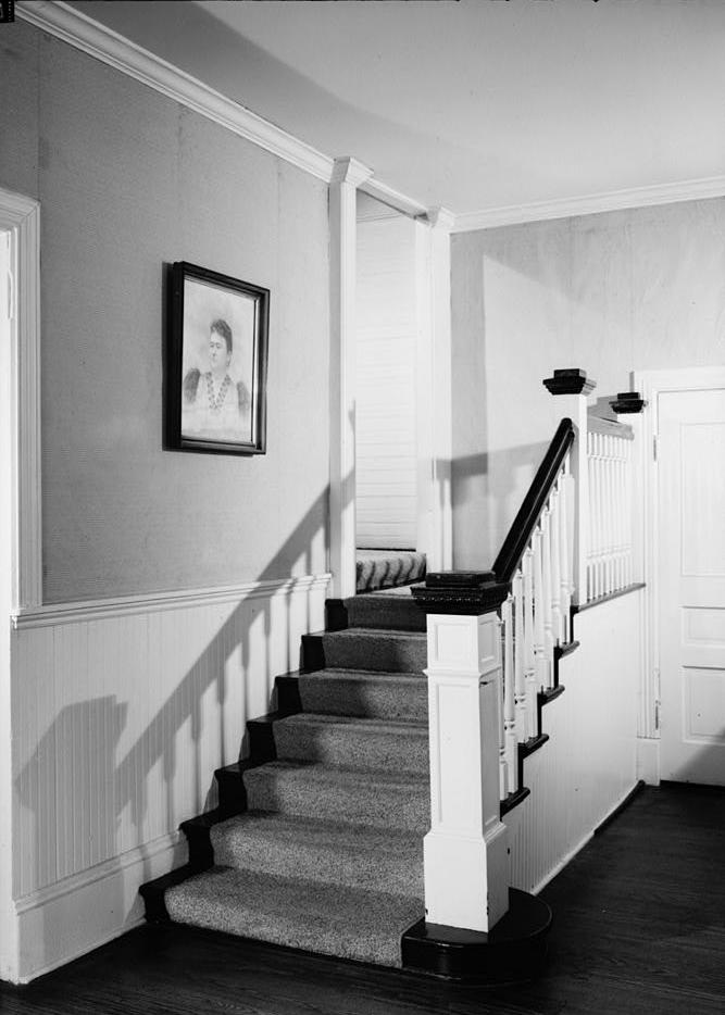 Excelsior Hotel, Jefferson Texas 1966 STAIR BEHIND REGISTRATION DESK, FIRST FLOOR LOBBY, c. 1872 WING.
