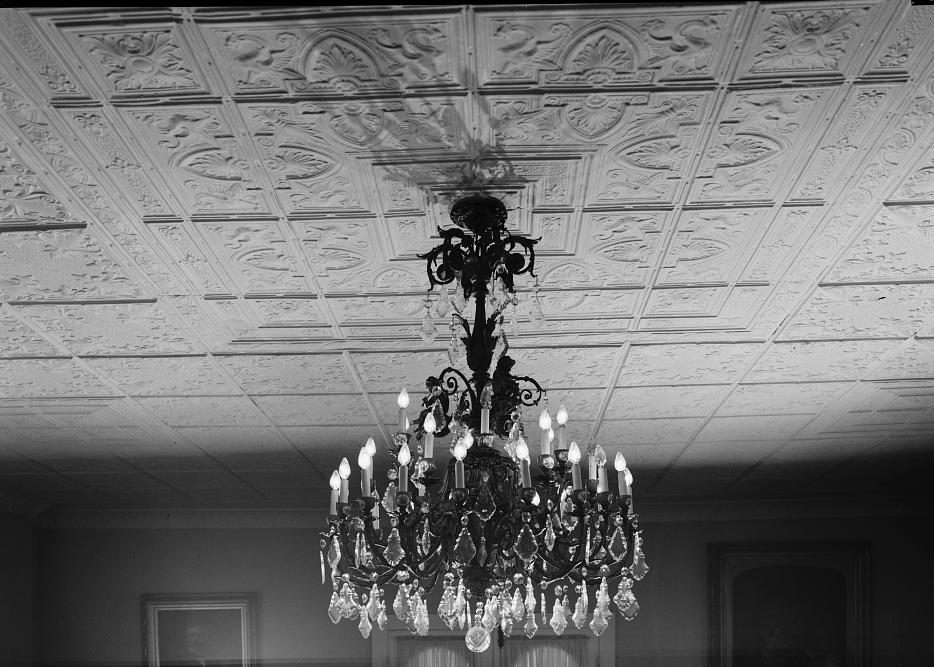 Excelsior Hotel, Jefferson Texas 1966 DETAIL OF PRESSED METAL CEILING IN BALLROOM, FIRST FLOOR, c. 1872 WING. PERIOD CHANDELIER INSTALLED c. 1956.