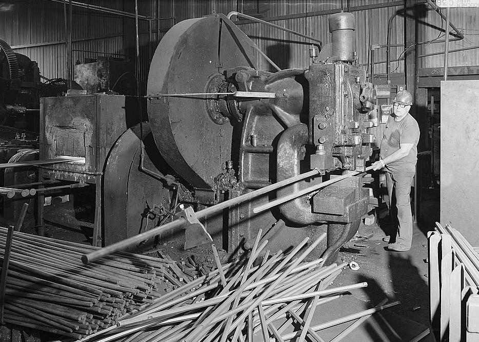 Warwood Tool Company, Wheeling West Virginia INTERIOR VIEW, SHEARING OF RAW STOCK USING CLEVELAND SHEAR; JOHN TOTH, OPERATOR 1990