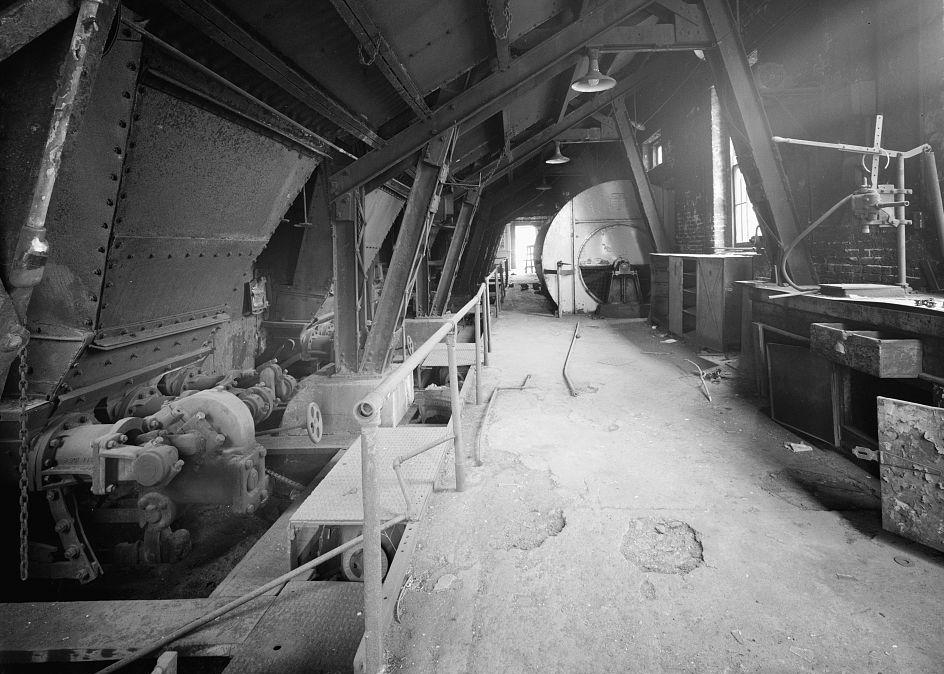 Baltimore & Ohio Railroad, Mount Clare Shops, Baltimore Maryland LOOKING DOWN WALKWAY INSIDE CENTRAL POWER PLANT SHOWING BOTTOM OF COAL HOPPERS (1976)