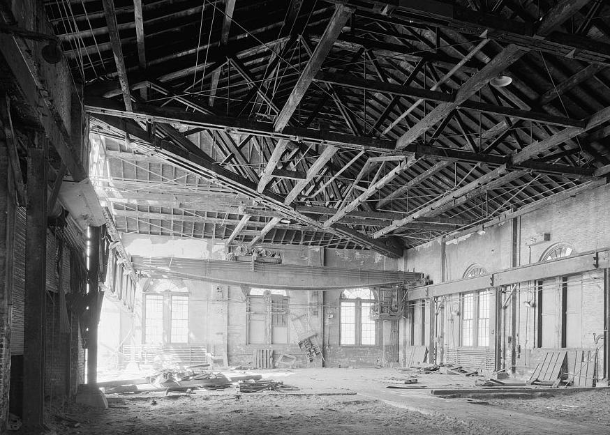 Baltimore & Ohio Railroad, Mount Clare Shops, Baltimore Maryland INTERIOR OF FOUNDRY SHOWING HEAVY TIMBER ROOF TRUSSES AND TRAVELING CRANE (1976)